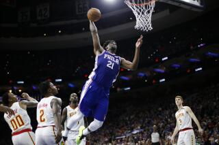 Big Max Embiid signs 196 million extension with 76ers AP News